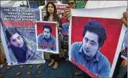  ?? FAREED KHAN / AP 2017 ?? Members of a Pakistani civil society group demonstrat­e in Karachi, Pakistan, in April against the mob killing of university student Mohammad Mashal Khan in Mardan that month over blasphemy charges.