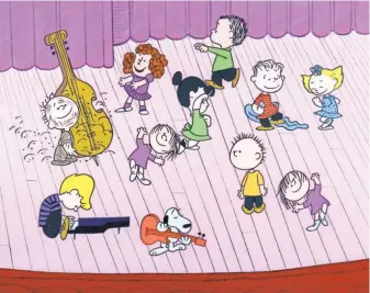  ?? © 1965 UNITED FEATURE SYNDICATE ?? The Linus and Lucy theme, written by Vince Guaraldi, became part of an iconic scene in A Charlie Brown Christmas, though the network had been unsure about combining jazz and Christmas.