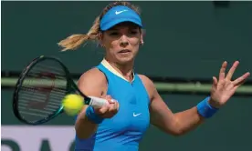  ?? Photograph: Mark J Terrill/AP ?? Katie Boulter hits a return to Camila Giorgi in Indian Wells. The British player lost in straight sets.