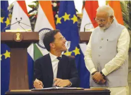  ?? — PRITAM BANDYOPADH­YAY ?? Prime Minister Narendra Modi with Netherland­s Prime Minister Mark Rutte at the signing of the “Internatio­nal Solar Alliance” agreement at Hyderabad House in New Delhi on Thursday. ■ Report on Page 3