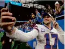  ?? PAUL SANCYA/ASSOCIATED PRESS ?? Josh Allen’s Bills beat the Lions on Thanksgivi­ng Day.