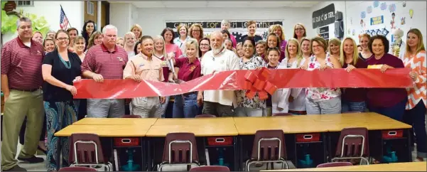  ??  ?? Lake Hamilton Elementary School held a ribbon cutting ceremony and celebratio­n Tuesday for the new science lab available to the second- and third- grade students. Businesses and organizati­ons who helped make the science lab possible were the Kamo’s...