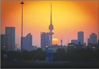  ??  ?? A golden sunset over Kuwait City. — Nawaf Alhmoud-KUNA