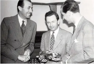  ??  ?? Below left: At an end-1952 celebrator­y dinner ‘Tin’ Berckheim, right, and Giovanni ‘Johnny’ Lurani received silver Porsche models from Ferry Porsche, centre, for whom their Mille Miglia success was a big step toward proving the merit of the new ‘Porsche’ car
Below right: Former Porsche engineer Max Troesch had the advantage over his rivals with the first detailed appreciati­on of the Type 356 when it made a visit to Switzerlan­d as a precursor to exports of Porsches from Austria to that country