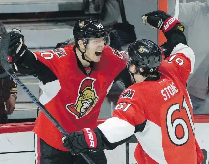 ??  SEAN KILPATRICK/THE CANADIAN PRESS ?? Alex Chiasson, left, celebrates his game-winning goal Monday against the San Jose Sharks with Mark Stone.
