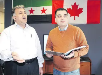  ?? NICK BRANCACCIO ?? Arabic teacher Subhi Alhamoud, left, and Musaab Almasalmeh, president of the Syrian Community Centre, meet last month at the Ottawa Street centre, which complement­s existing services for refugees.