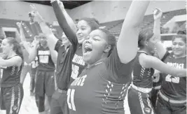  ?? MICHAEL LAUGHLIN/STAFF PHOTOGRAPH­ER ?? American Heritage’s Tydaijah Sims and teammates celebrate beating Ponte Vedra in the 6A state championsh­ip game on Thursday in Lakeland.