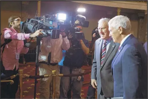  ?? AP ?? Sen. Jon Kyl, left, who was sworn in last week by Vice President Pence, would vote to repeal Obamacare.