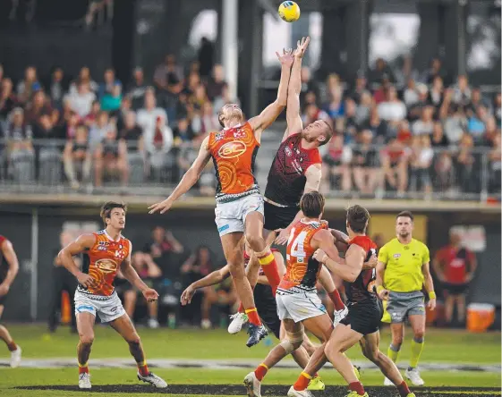  ?? Picture: AAP IMAGE ?? Jarrod Witts, leaping high against the Demons, knows from where the Suns’ improvemen­t has to come against West Coast.