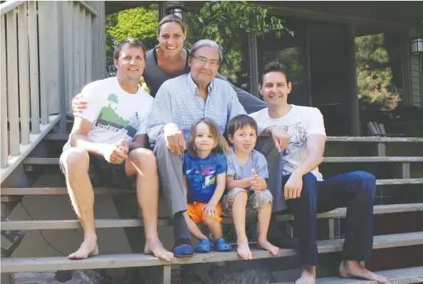  ??  ?? Michael Kovrig, left, at his sister Ariana’s east-end Toronto home, with father Bennett, nephews Kai and Sebastian, and brother-in-law Tim Botha.