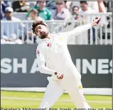  ??  ?? Pakistan’s Mohammad Amir bowls during play on day three of Ireland’s inaugural Test match against Pakistan
at Malahide Cricket Club, in Dublin on May 13. (AFP)