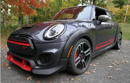  ?? MARC GRASSO PHOTOS / BOSTON HERALD ?? MAKING A STATEMENT: The MINI Cooper GP is a speedy two-seater that’ll get you going with quick accelerati­on and a stylish look to match.