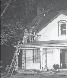  ?? SUBMITTED ?? Firefighte­rs from Brooklyn and Hantsport responded to a ‘stubborn’ chimney fire in Falmouth on March 10.