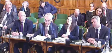  ??  ?? Bosses of the liquidated outsourcin­g and constructi­on company Carillion (L-R) chief executive Keith Cochrane, chair Philip Green, finance director Emma Mercer and chief executive officer Richard Howson give evidence to a UK parliament­ary committee. (AFP)