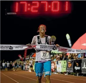  ?? MELISSA RUSE ?? Global trail-running superstar Courtney Dauwalter as she crosses the line first in the Western States Endurance Run, a 100-mile race.