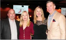  ?? NWA Democrat-Gazette/CARIN SCHOPPMEYE­R ?? Daril Lattanzio and Mary Anne (from left) and Julie and Keith Barber help support the Cystic Fibrosis Foundation at the 11th annual Wine Opener on Feb. 9 at the John Q. Hammons Center in Rogers.