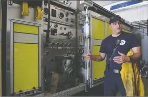  ?? BEA AHBECK/NEWS-SENTINEL ?? Lodi Fire Department Captain David Bolognini talks about the Type 1 engine, which was used when Lodi Fire deployed as a strike team during the Detwiler Fire, at Station 2 in Lodi on Friday.