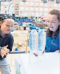  ?? ?? A young visitor enjoying some fun science with the Canal & River Trust’s Anna Birt.