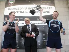  ??  ?? St John’s Paul McNamara and Niall Walsh with Johnny Watters, Sligo County Board vice-chairman after the county final.