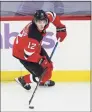  ?? Rich Grassle / Icon Sportswire via Getty Images ?? Devils right wing Tyce Thompson skates against the Sabres in his NHL debut on Tuesday at the Prudential Center in Newark, NJ.