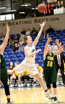  ?? Bud Sullins/Special to Siloam Sunday ?? Junior guard Jana Schammel scored 13 points off the bench Tuesday in John Brown’s 67-62 loss to Science and Arts (Okla.) in the opening round of the Sooner Athletic Conference Tournament at Bill George Arena.