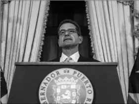  ?? PHOTO/ ?? Pedro Pierluisi, sworn in as Puerto Rico’s governor, attends a press conference in San Juan, Puerto Rico, on Friday. AP DENNIS M. RIVERA PICHARDO