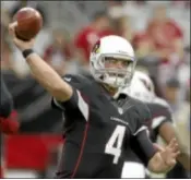  ??  ?? Arizona Cardinals’ Kevin Kolb warms up prior to an NFL football game against the Philadelph­ia Eagles Sunday,