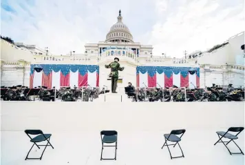  ??  ?? A military band rehearses Monday for the inaugural ceremony for President-elect Joe Biden and Vice President-elect Kamala