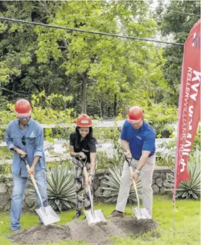  ??  ?? Breaking ground for the new Roystonea housing developmen­t in Tower Isle, St Mary,s are (from left) Robert Marsh, developer; Melissa Geddes-morrison, KW Realtor associate; and Rory Marsh, CEO, KW Jamaica.