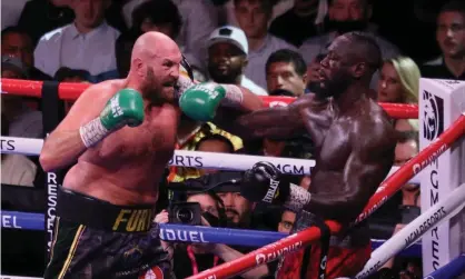  ?? Photograph: James Atoa/UPI/REX/Shuttersto­ck ?? Tyson Fury and Deontay Wilder produced a memorable fight in Las Vegas.