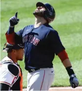  ?? ROB CARR/GETTY IMAGES ?? The Red Sox’ J.D. Martinez hit three home runs Sunday against the Orioles.