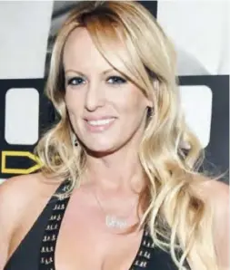  ??  ?? caption President Donald Trump denies the allegation­s made by Stormy Daniels