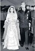  ??  ?? Lifelong partnershi­p: Princess Elizabeth with dashing Philip on their wedding day