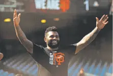  ?? Jason O. Watson / Getty Images ?? Pablo Sandoval got the call-up from the GIants and warms up before his first game back — against the Diamondbac­ks.