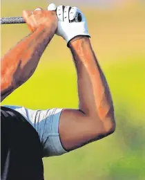  ?? GETTY IMAGES ?? Tiger Woods plays a shot during a practice round at Portrush ahead of the British Open which starts tomorrow