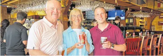  ?? CONTRIBUTE­D ?? Fundraisin­g chair Tom Hayes and Jane Ritcey of the Lunenburg Academy Foundation are shown with business owner Adam Bower of the Shipwright Brewing Company at Bower's Bellringer Red Ale launch on Aug. 3.