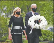  ?? (AP/Patrick Semansky) ?? Joe Biden, the Democratic presidenti­al candidate and former vice president, and his wife, Jill, arrive Monday to lay a wreath at Veterans Memorial Park at the Delaware Memorial Bridge in New Castle.