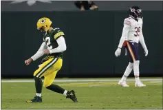  ?? JEFFREY PHELPS — THE ASSOCIATED PRESS ?? Green Bay Packers quarterbac­k and Chico native Aaron Rodgers (12) reacts after throwing a touchdown pass against the Chicago Bears on Sunday in Green Bay, Wis.