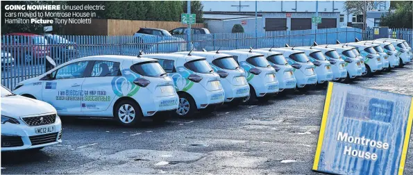  ?? ?? GOING NOWHERE Unused electric cars moved to Montrose House in Hamilton Picture Tony Nicoletti