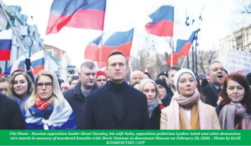  ?? KUDRYAVTSE­V / AFP ?? File Photo - Russian opposition leader Alexei Navalny, his wife Yulia, opposition politician Lyubov Sobol and other demonstrat­ors march in memory of murdered Kremlin critic Boris Nemtsov in downtown Moscow on February 29, 2020. - Photo by Kirill