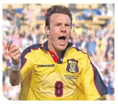  ??  ?? Craig Burley celebrates scoring against Norway at France 98 (left), and hopes the current Scotland set can make it to next year’s Finals