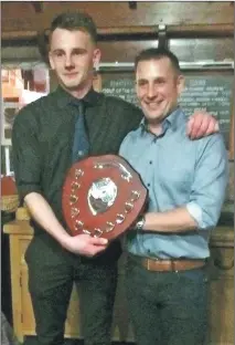  ??  ?? Ruairidh MacDonald was presented with the Johnnie MacDonald Memorial Shield from chairman Scott Bremner.