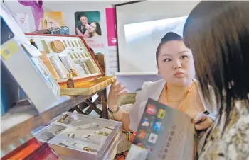  ?? PHOTOS BY NAN SHAN AND WANG JINGSHENG / FOR CHINA DAILY ?? Chinese skincare brands are seeking to rejuvenate themselves by appealing to younger shoppers, with a heavy focus on putting traditiona­l Chinese medicine in their manufactur­e.