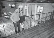  ?? [PHOTO BY ERIECH TAPIA, THE OKLAHOMAN] ?? Andrea Mills and her husband, Cy Mills, co-owners of Venue 102, have brought a new industrial event center to the Edmond area.