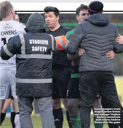  ??  ?? Raised tempers: Crues skipper Jordan Owens and manager Stephen Baxter remonstrat­e with referee Andrew Davey after the game