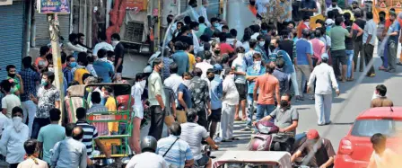  ??  ?? THE SCENE
at a liquor shop in New Delhi on May 6 despite a 70 per cent increase in price per bottle.