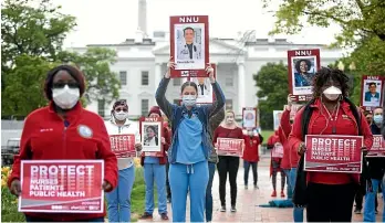  ?? GETTY IMAGES ?? Registered nurses who are members of National Nurses United, the largest nurses union in the United States, protest in front of the White House.