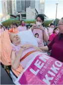  ?? CTTO ?? MRS. EVELYN attending the miting de avance of Leni Robredo.