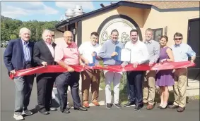  ?? Middlesex County Chamber of Commerce / Contribute­d photo ?? Café Fiore in Cromwell celebrated a grand opening Sept. 2. From left are Middlesex County Chamber of Commerce President Larry McHugh, Willowbroo­k Spirit Shoppe owner and former chamber chairman Jay Polke, Town Manager Anthony Salvatore, owner Rusit Cecunjanin, Mayor Enzo Faienza, restaurant manager Valon Avdimetaj, Cromwell Automotive owner and Cromwell Division Chairman Rodney Bitgood, state Rep. Christie Carpino, R-Cromwell; and Town Planner Stuart Popper.