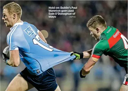  ?? INPHO ?? Hold on: Dublin’s Paul Mannion goes past Eoin O’Donoghue of Mayo